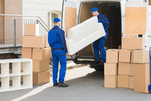 Manwithvan team assisting with packing